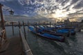 Venice's Santa Maria della Salute sunset view with row of gondola boats Royalty Free Stock Photo