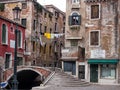 Venice street and footbridge crossing the canal in san polo