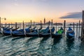 Venice sunrise and Venice gondolas on San Marco square at sunrise, Grand Canal, Venice, Italy Royalty Free Stock Photo