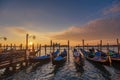 Venice sunrise and Venice gondolas on San Marco square at sunrise, Grand Canal, Venice, Italy Royalty Free Stock Photo