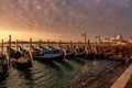 Venice sunrise and Venice gondolas on San Marco square at sunrise, Grand Canal, Venice, Italy Royalty Free Stock Photo