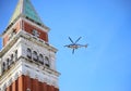 Venice, VE, Italy - February 13, 2024: Bell tower of Saint Mark and Italian Police helicopter Royalty Free Stock Photo