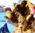 Venice, VE, Italy - February 13, 2024: Mask at the Carnival with very large feathered headdress Royalty Free Stock Photo