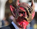 Venice, VE, Italy - February 5, 2018: masked man with the terrifying mask of the devil