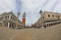 Venice, VE, Italy - May 18, 2020: Bell tower of Saint Mark in the main square and Ducal Palace during lockdown Royalty Free Stock Photo