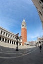 Venice, VE, Italy - May 18, 2020: Bell tower of Saint Mark in the square and National Library called biblioteca marciana Royalty Free Stock Photo