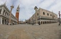 Venice, VE, Italy - May 18, 2020: Bell tower of Saint Mark and Ducal Palace with fisheye lens Royalty Free Stock Photo