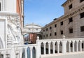 Venice, VE, Italy - May 18, 2020:. Statue of Drunken Noah from the Facade of Ducal Palace and the bridge of sighs Royalty Free Stock Photo