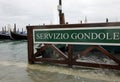 Venice, VE, Italy - November 12, 2019: high tide and text SERVIZ