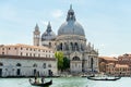 Gondolas Glide by the Santa Maria della Salute in Venice Royalty Free Stock Photo