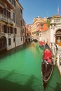 VENICE, VENETO, ITALY - Tourists, gondola riding, typical canal in Venice, September 21, 2017 Royalty Free Stock Photo