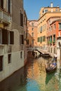 VENICE, VENETO, ITALY - Tourists, gondola riding, typical canal in Venice, September 21, 2017 Royalty Free Stock Photo