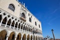 Venice, white Doge palace facade and San Marco lion statue, Italy Royalty Free Stock Photo