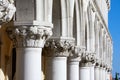 Venice, white sculptures of Doge palace colonnade Royalty Free Stock Photo