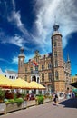 Beautiful dutch square, exterior cafes and restaurants, medieval old town hall, blue summer sky