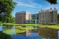 Beautiful dutch castle hotel with idyllic water pond in summer Royalty Free Stock Photo