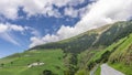 The Venosta Valley above Silandro, South Tyrol, Italy, on a beautiful sunny day with passing clouds. Time lapse Motion