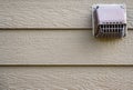 Residential vent pest screen on the side of a house Royalty Free Stock Photo