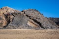 Ventifact rock formations caused by wind at La Pared Beach, Fuerteventura Royalty Free Stock Photo