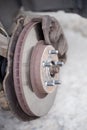 Ventilated brake disc on used car, removed wheel, selective focus Royalty Free Stock Photo