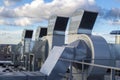 Ventilation and air conditioning system installed on the roof of an office building, galvanized elements of air ducts