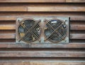 Ventilation fan with old condition and rust in wooden wall background Royalty Free Stock Photo