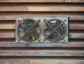 Ventilation fan with old condition and rust in wooden wall background