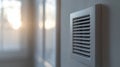 Ventilation grid on a sunlit interior wall Royalty Free Stock Photo