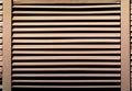 Ventilation grille on the wall as an abstract background. Texture Royalty Free Stock Photo