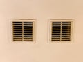 Ventilation grilles on ventilation ducts in the ceiling of the building. shaft in the wall for air Royalty Free Stock Photo