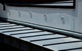 Ventilation grilles on the facade under the roof. ventilate moisture from the house that forms under polystyrene insulation. metal Royalty Free Stock Photo