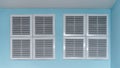 Ventilation grilles mounting securely against pale blue wall, providing optimal air circulation in clean, modern interior setting Royalty Free Stock Photo