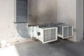 Ventilation pipes in silver insulation material hanging from the ceiling inside new building Royalty Free Stock Photo