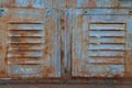 Ventilation slots in a rusted metal sheet cover Royalty Free Stock Photo