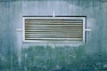 Ventilation steel grill on a concrete wall Royalty Free Stock Photo