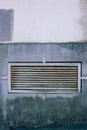 Ventilation steel grill on a concrete wall Royalty Free Stock Photo