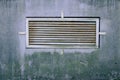 Ventilation steel grill on a concrete wall Royalty Free Stock Photo