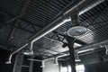 Ventilation system on the ceiling of large buildings. Ventilation pipes in silver insulation material hanging from the Royalty Free Stock Photo