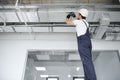 ventilation system installation and repair service. hvac technician at work. banner copy space Royalty Free Stock Photo