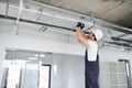 ventilation system installation and repair service. hvac technician at work. banner copy space Royalty Free Stock Photo