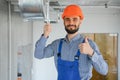 ventilation system installation and repair service. hvac technician at work. banner copy space. Royalty Free Stock Photo