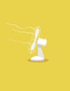 Ventilator for cooling air on yellow background. Hot summer heatwave symbol, white appliance.