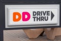 Ventnor City, New Jersey - December 30, 2020: A closeup view of a colorful Dunkin Donuts drive thru sign