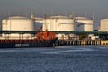 Ventspils, Latvia - August 14, 2022: Large white oil fuel tanks in the port of Ventspils Royalty Free Stock Photo