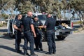Officers from the City of Ventura Police Department confer at a search of a suspect`s vehicle at Ventura Harbor.