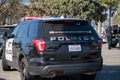 The rear of a City of Ventura Police Department SUV Ford Police Interceptor at the scene of a search