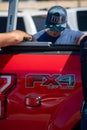 Firefighter wearing hat with Ventura City Fire Department on it at a training session