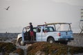 A Ventura Harbor Patrol vehicle and lifeguard watch over the beach and harbor area