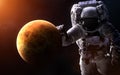 Venus on a blurred background with a giant astronaut. Elements of the image are furnished by NASA
