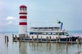 Venus vessel connecting Podersdorf and Rust in Austria on Neusiedler See with iconic lighthouse